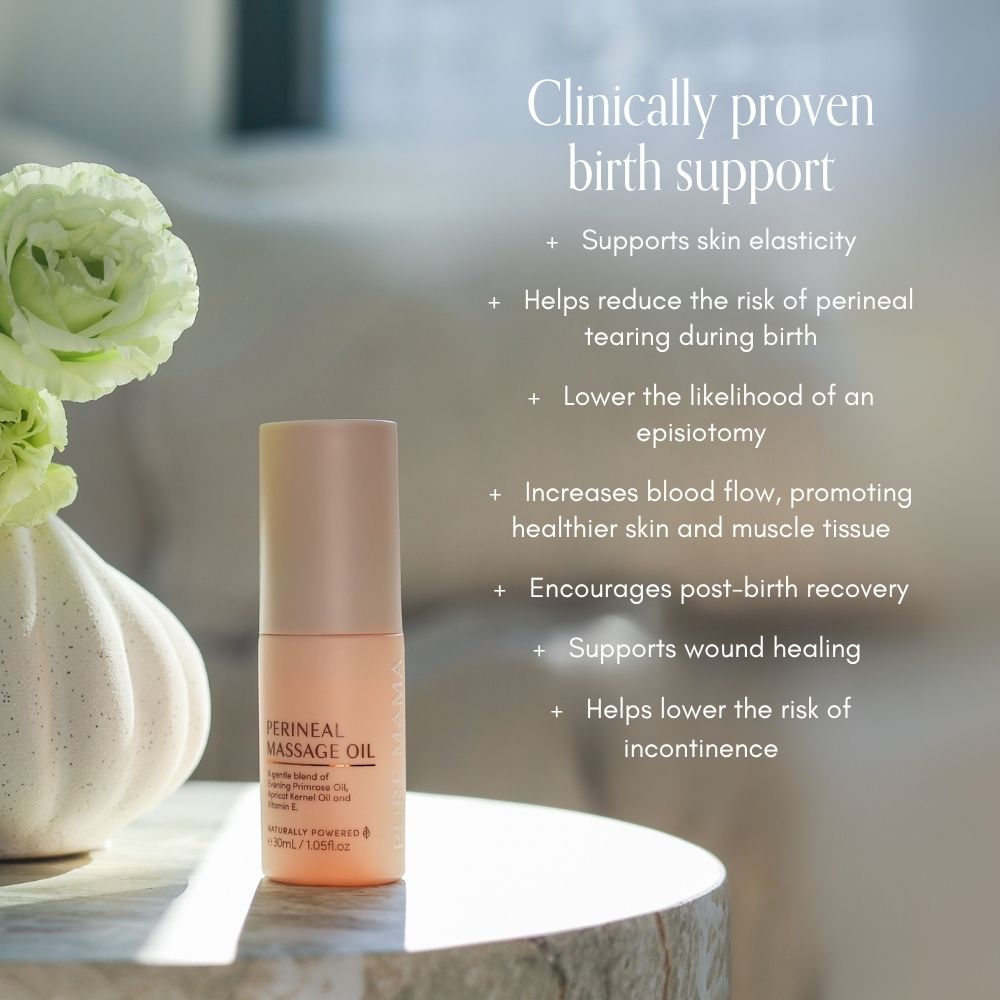 Pure Mama NZ Perineal Massage Oil sits on a marble surface next to white flowers, with text noting its benefits—increasing skin elasticity, helping reduce perineal tears, and supporting recovery after birth.