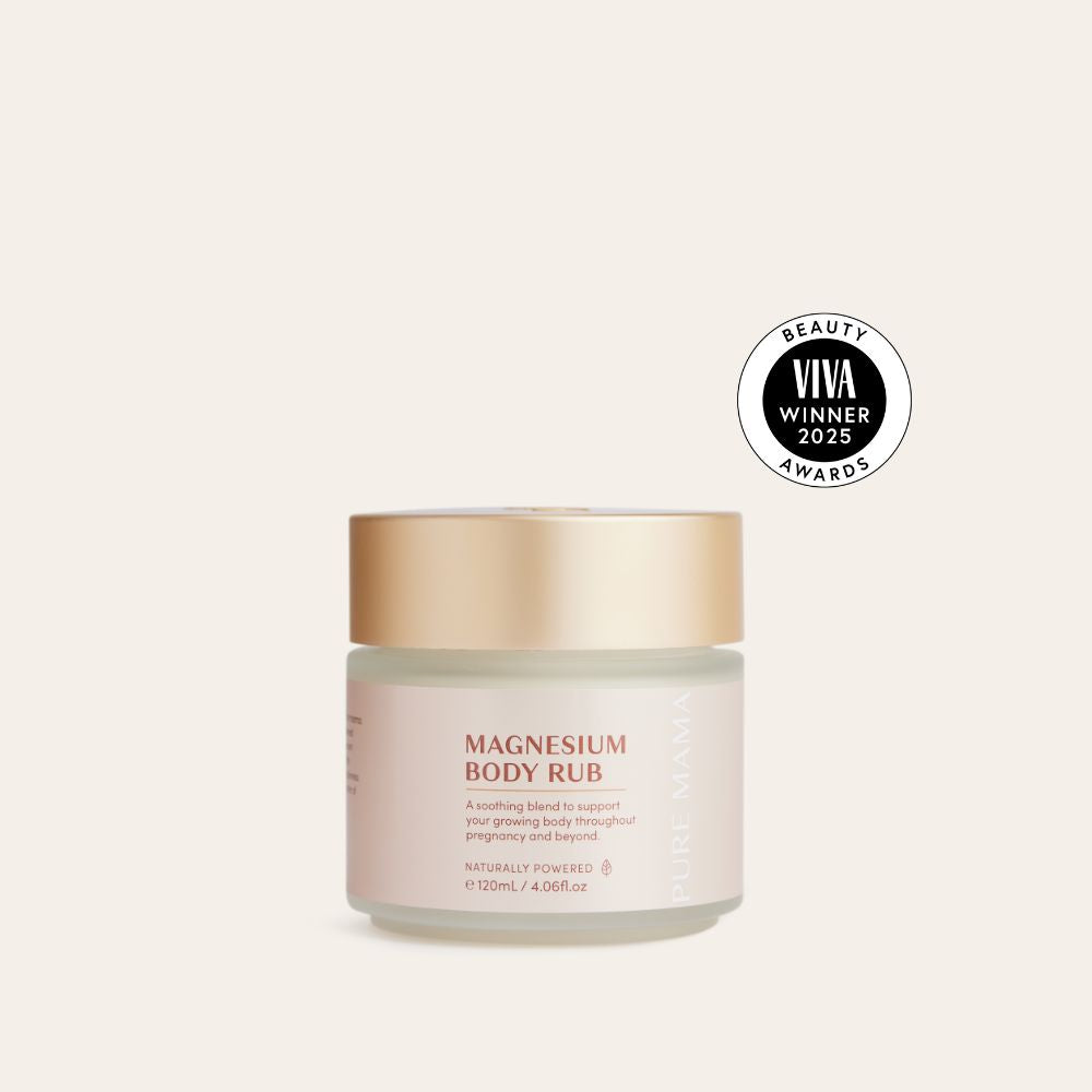 Pure Mama Magnesium Body Rub, featuring a gold lid and enriched with SyriCalm™ for muscle relaxation, is displayed on a beige background. A circular Viva Beauty Awards Winner 2025 badge is placed next to the jar.