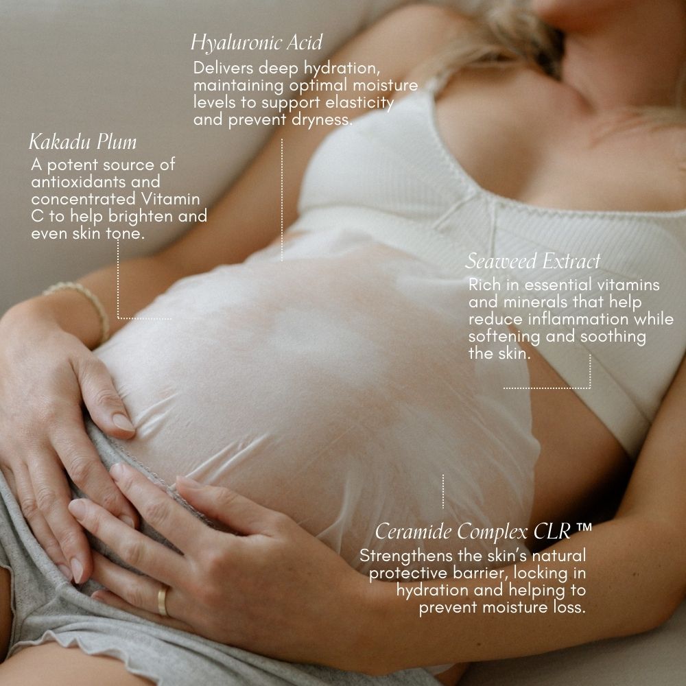 A pregnant person wears a white bra and uses the Pure Mama NZ Belly Spa Kit, applying a transparent belly moisture mask with Hyaluronic Acid, Kakadu Plum, Seaweed Extract, and Ceramide Complex CLR™ for skincare.